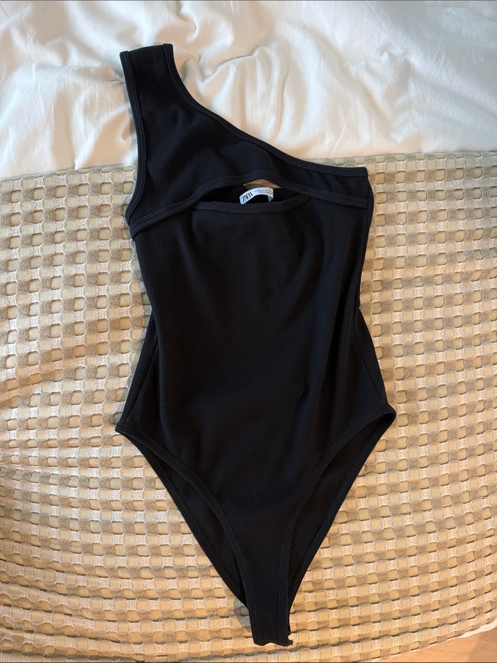 Black one shoulder bodysuit